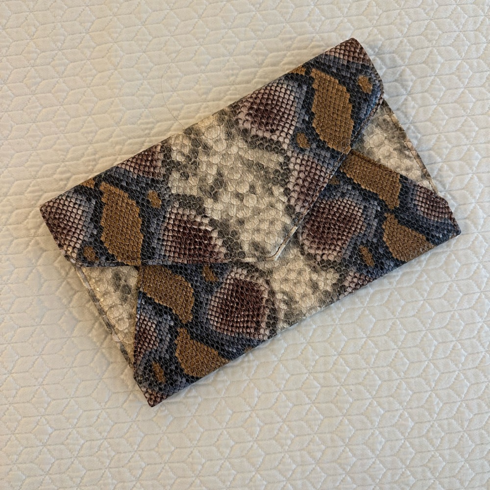 Multi colored snakeskin clutch